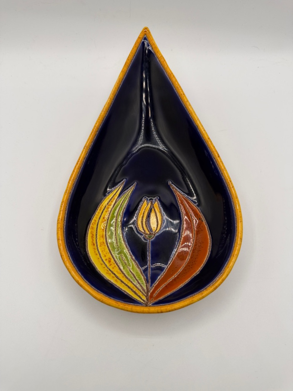 Decorative Teardrop Ceramic Wall Art in Navy with Yellow, Green & Brown Accents